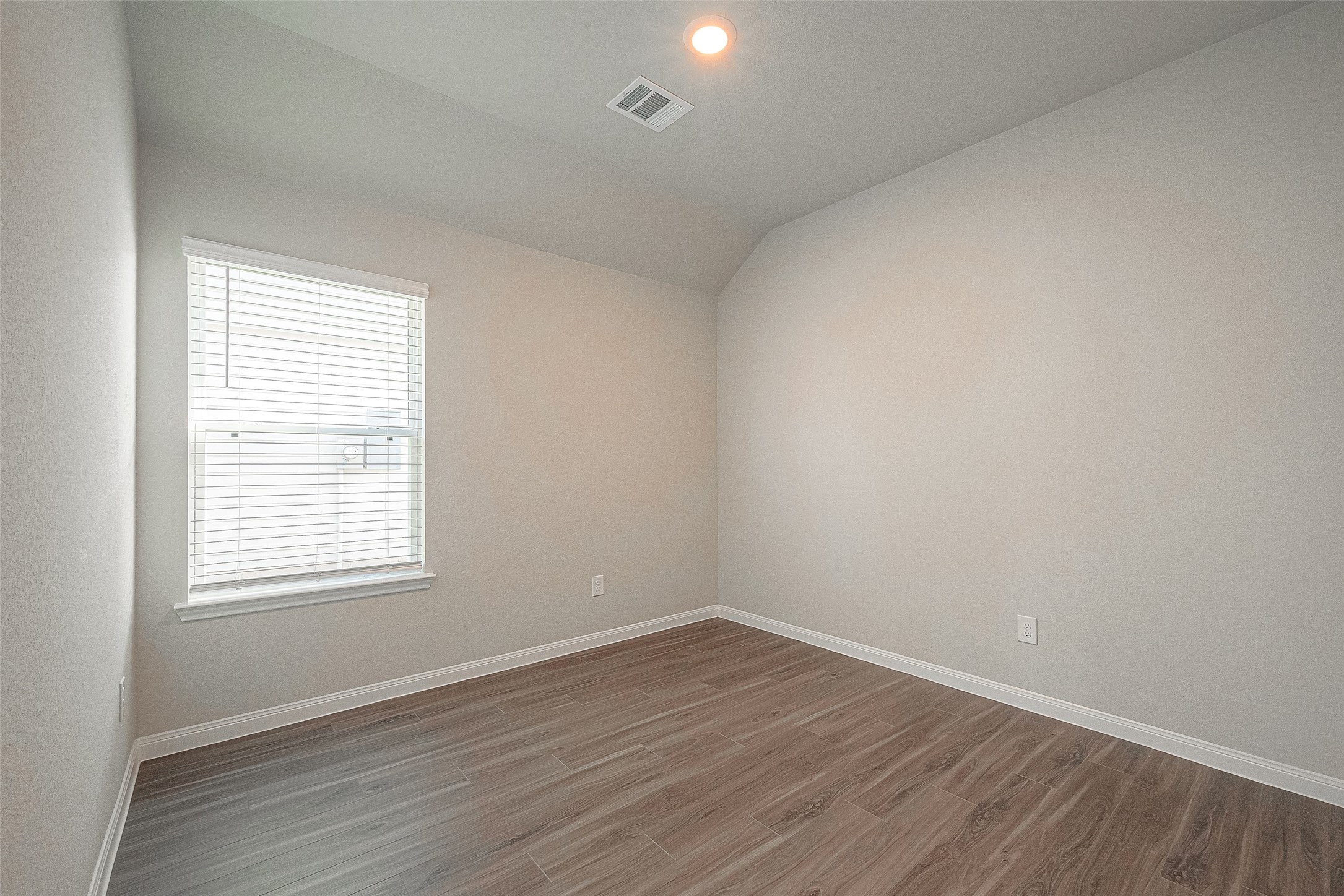 5318 Briana Dee Drive Rosharon, TX 77583 - Photo 18 of 29 wooden floor in an empty room with a window
