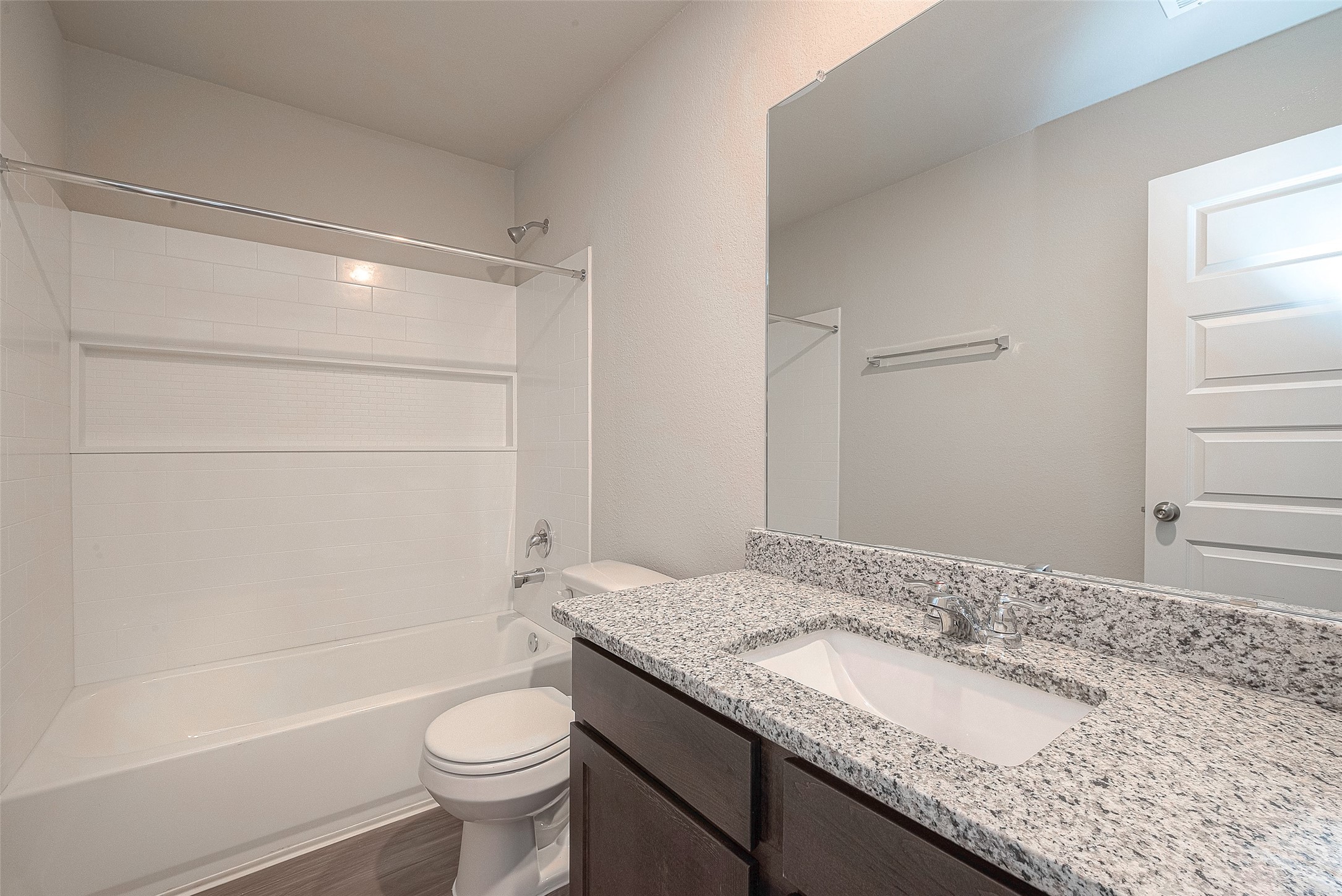 5318 Briana Dee Drive Rosharon, TX 77583 - Photo 19 of 29 a bathroom with a granite countertop sink toilet and shower