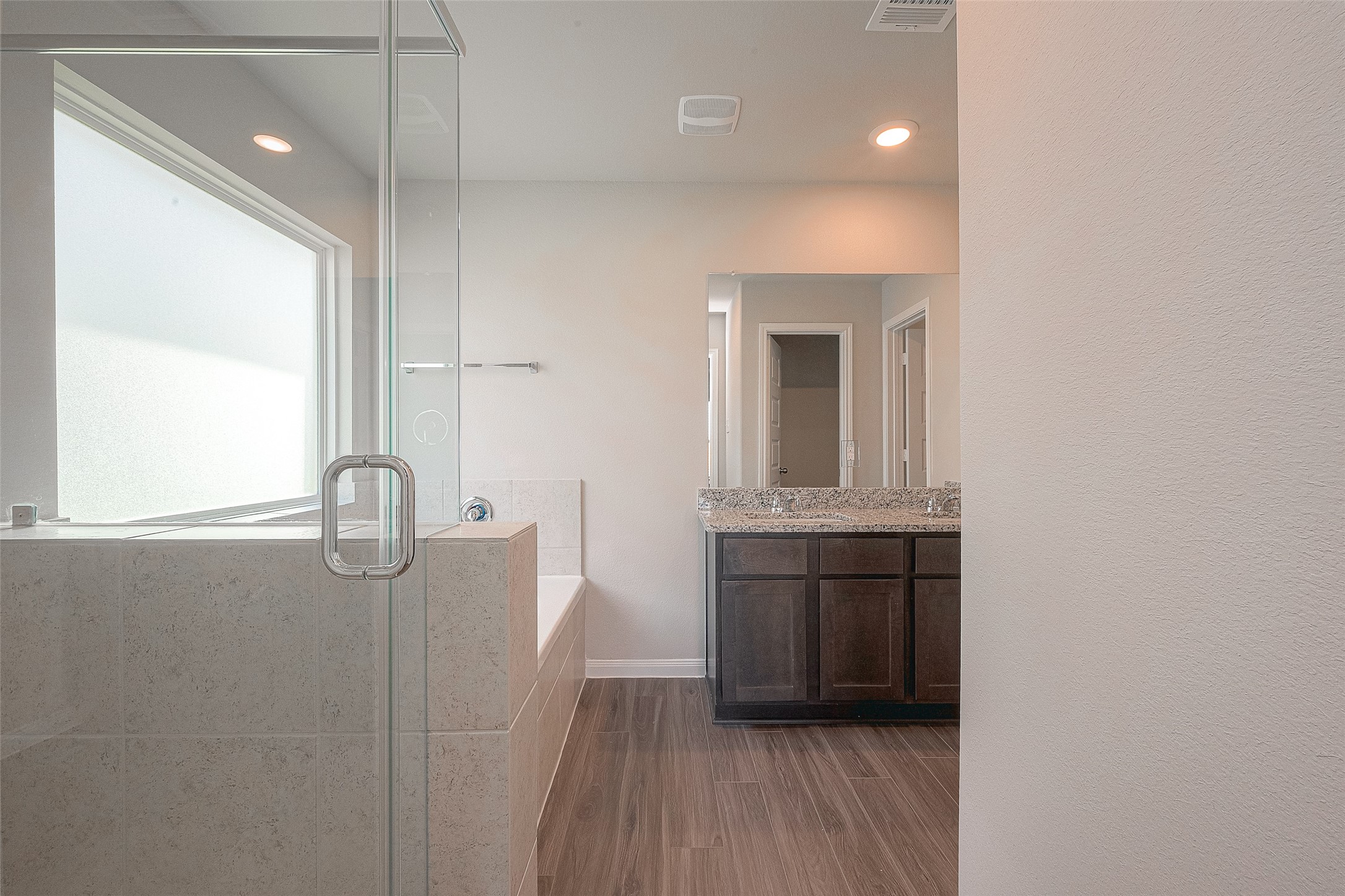 5318 Briana Dee Drive Rosharon, TX 77583 - Photo 23 of 29 a bathroom with a sink a vanity and mirror