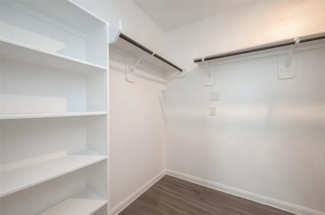 a view of an empty walk in closet