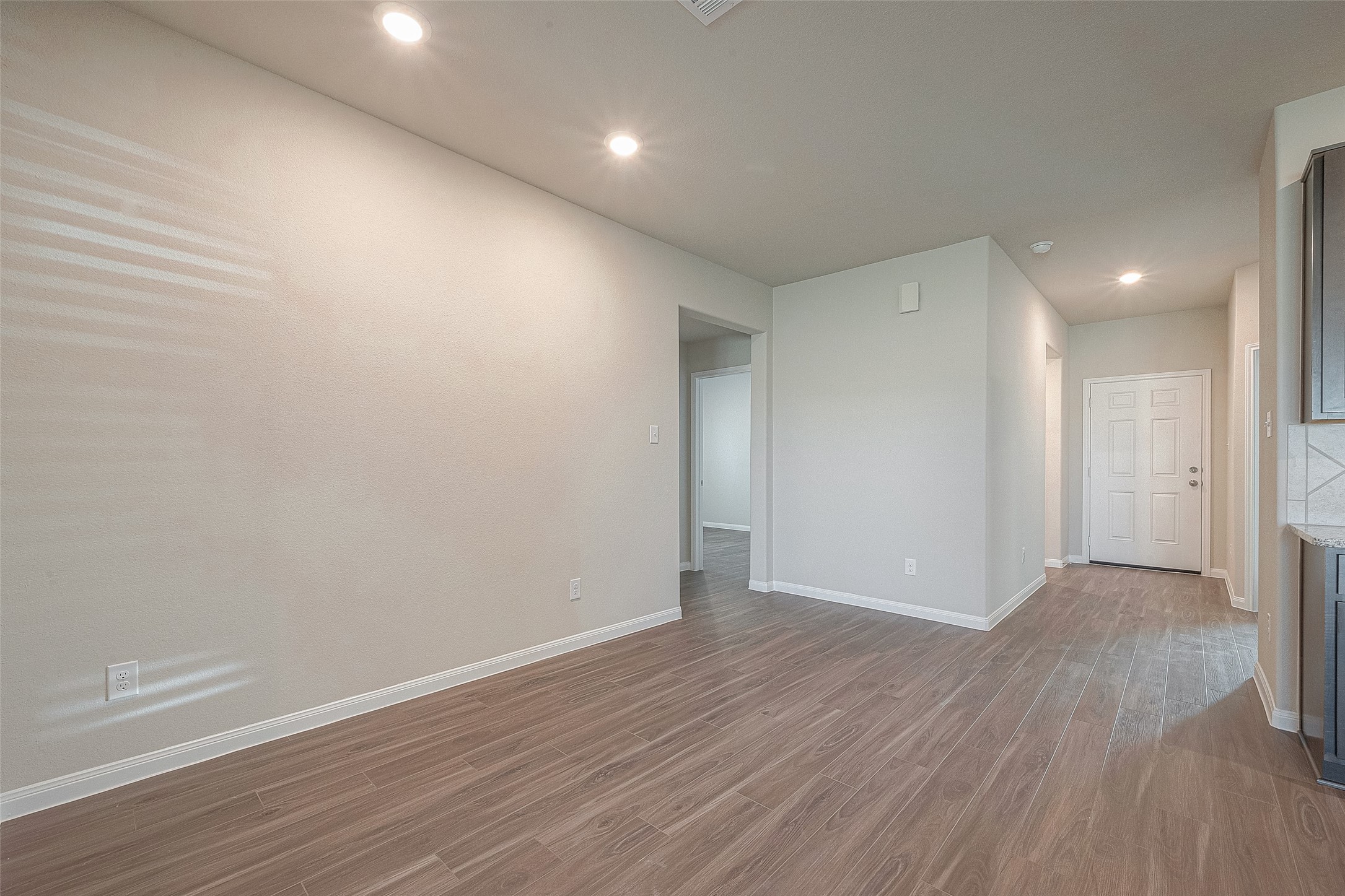5318 Briana Dee Drive Rosharon, TX 77583 - Photo 3 of 29 a view of an empty room with wooden floor