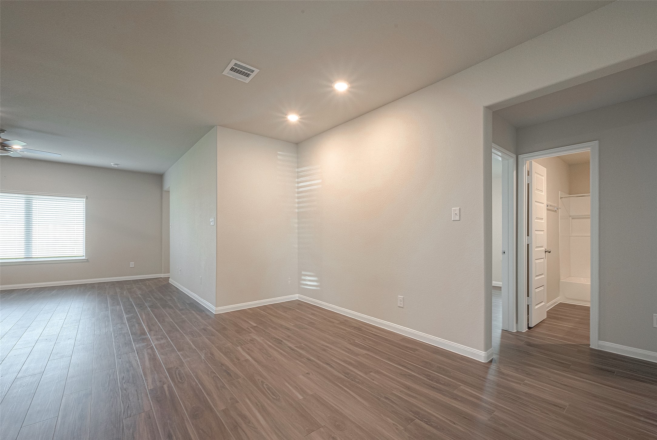 5318 Briana Dee Drive Rosharon, TX 77583 - Photo 6 of 29 wooden floor in an empty room with a window