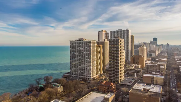 a view of a city with tall buildings