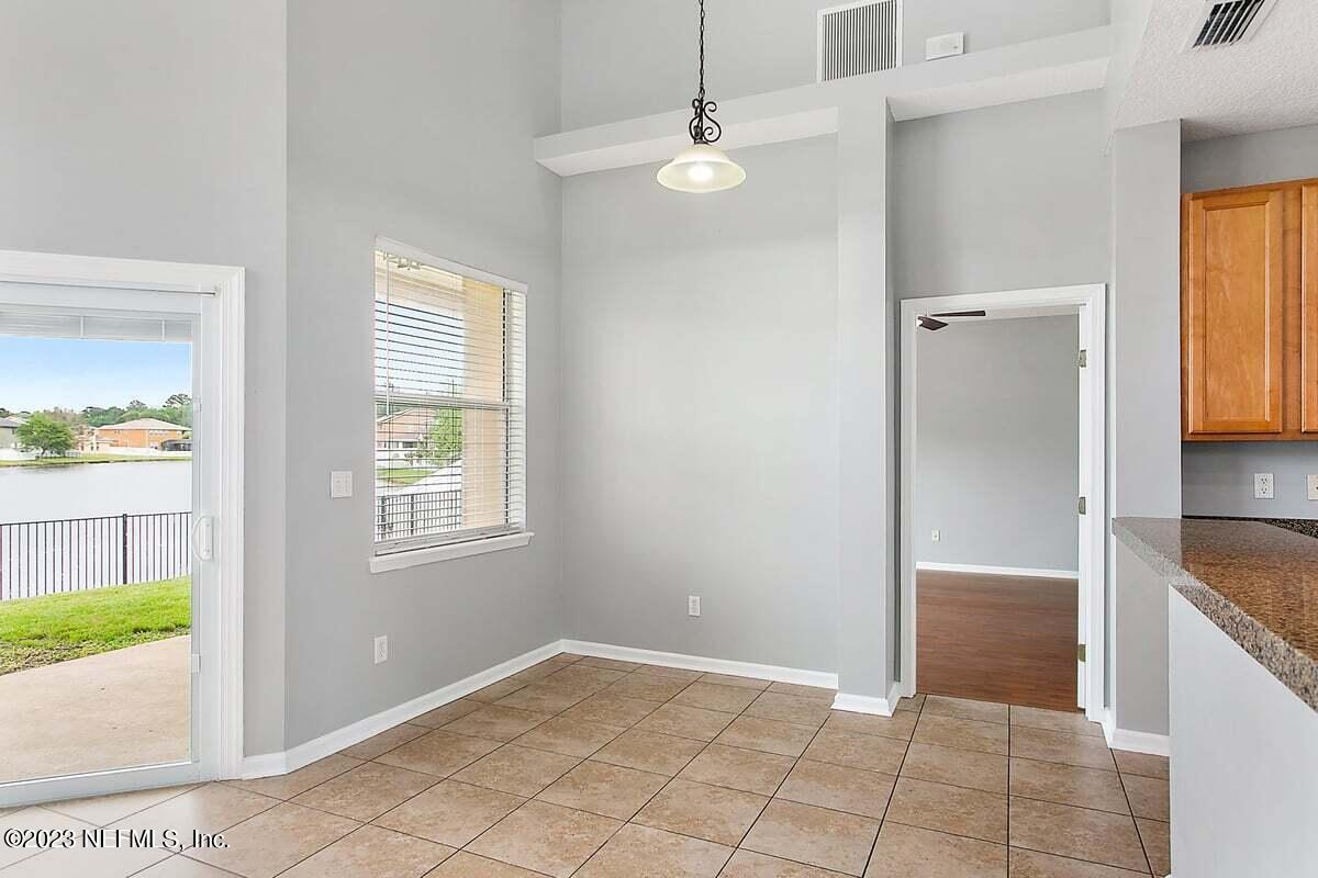 657 Reflection Cove Road Jacksonville, FL 32218 - Photo 12 of 27 657 - Kitchen Dining