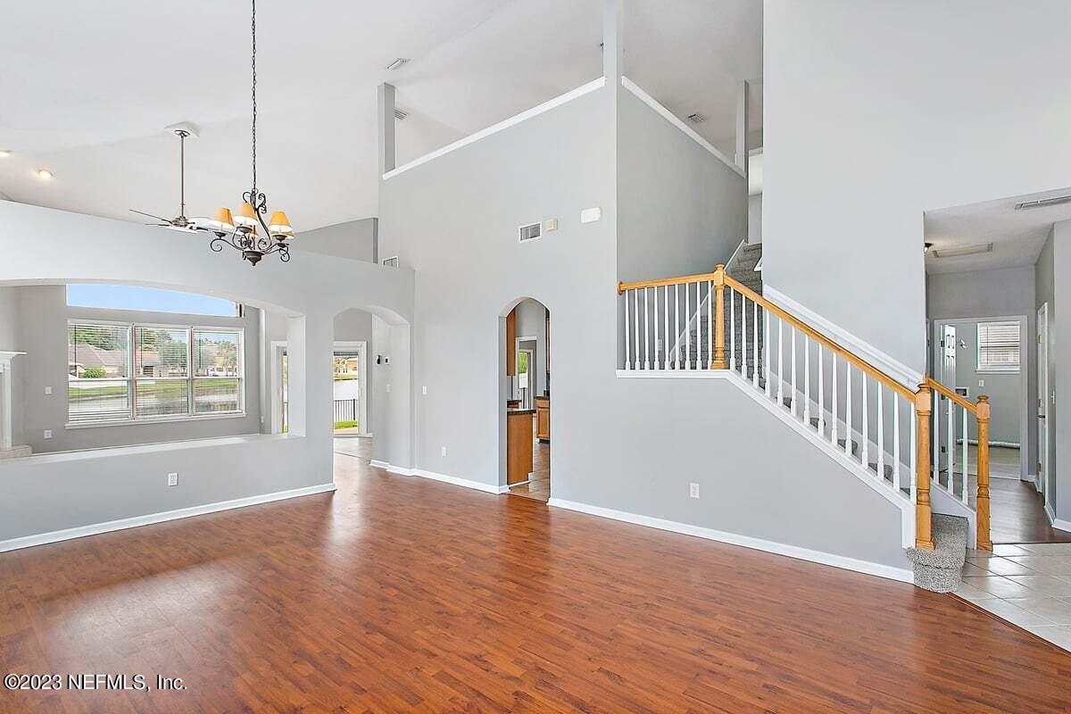 657 Reflection Cove Road Jacksonville, FL 32218 - Photo 3 of 27 657 - Living Room Dining Room 3