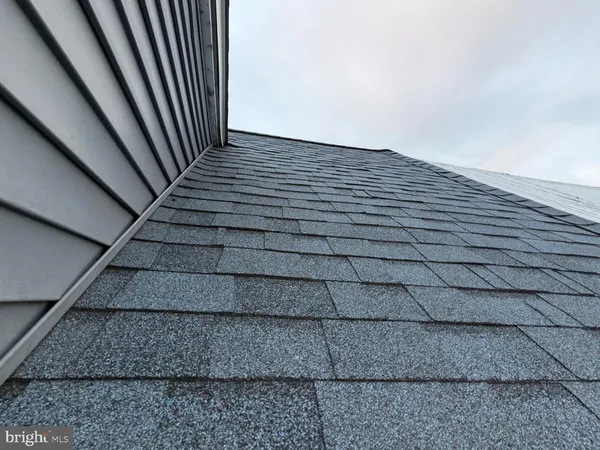 a view of staircase with white walls