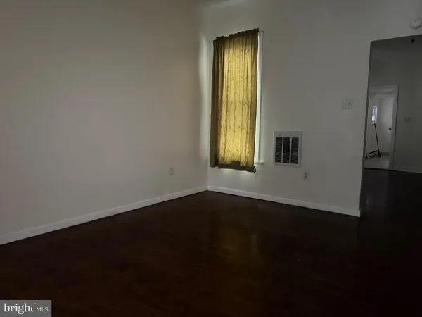 a kitchen with a stove sink and refrigerator