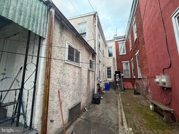 a view of a city street with workspace