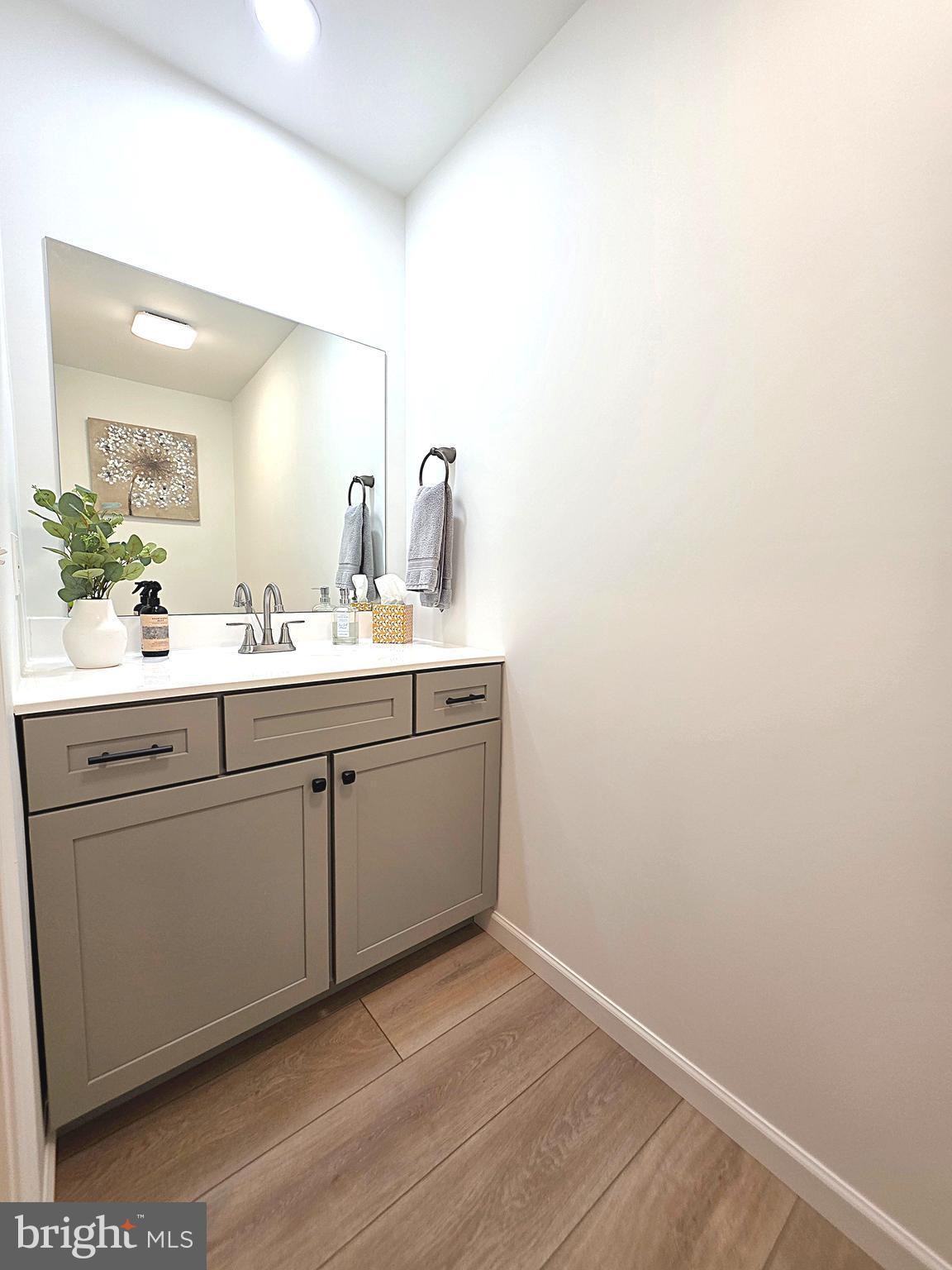 108 Bungalow Road Enola, PA 17025 - Photo 12 of 23 a room with a sink cabinets and a wooden floor