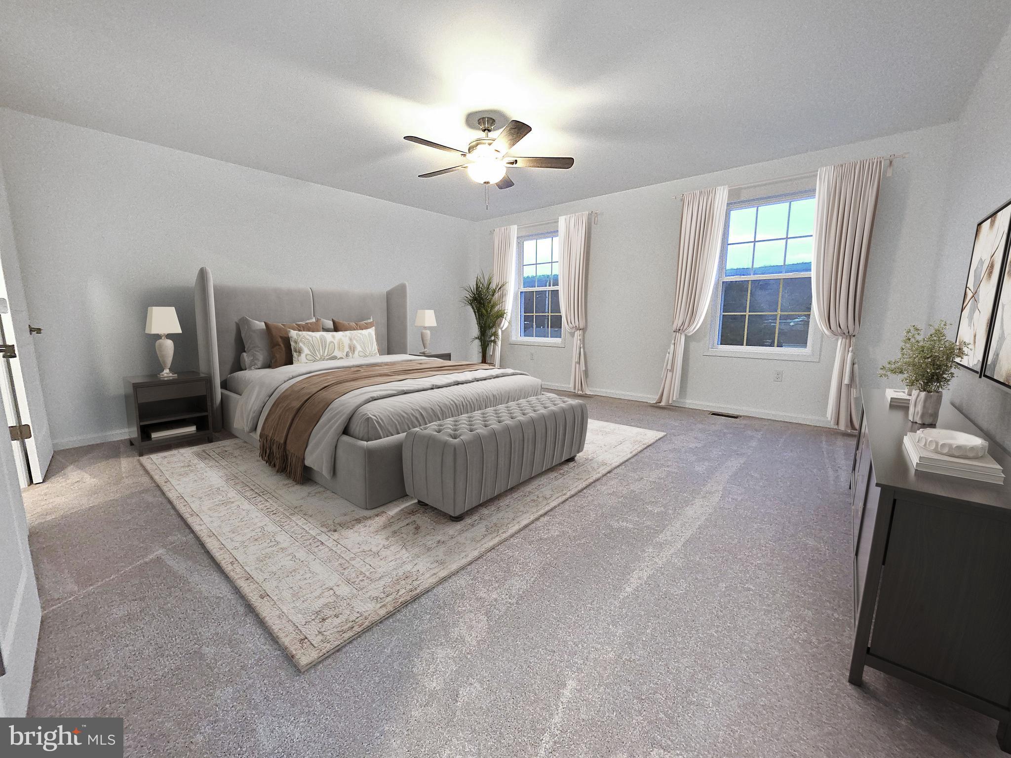 108 Bungalow Road Enola, PA 17025 - Photo 14 of 23 a spacious bedroom with a large bed and a chandelier