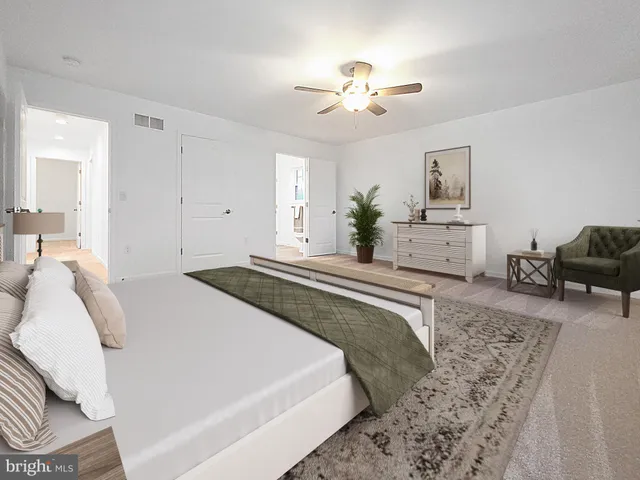 a bed room with a bed and a chandelier