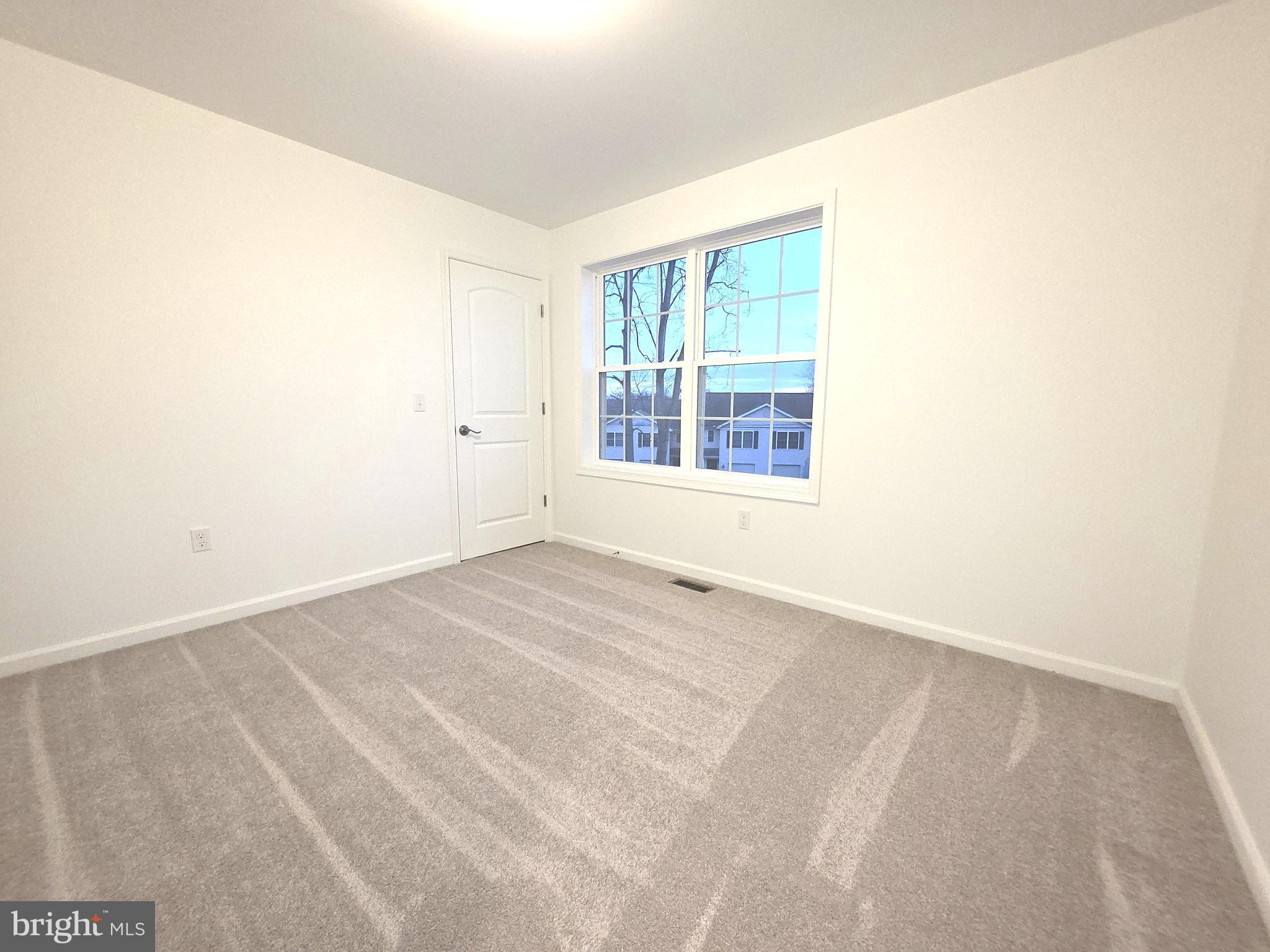108 Bungalow Road Enola, PA 17025 - Photo 19 of 23 an empty room with a window