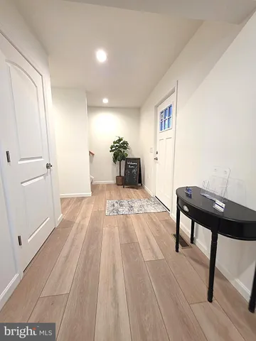 a bedroom with a bed and a table