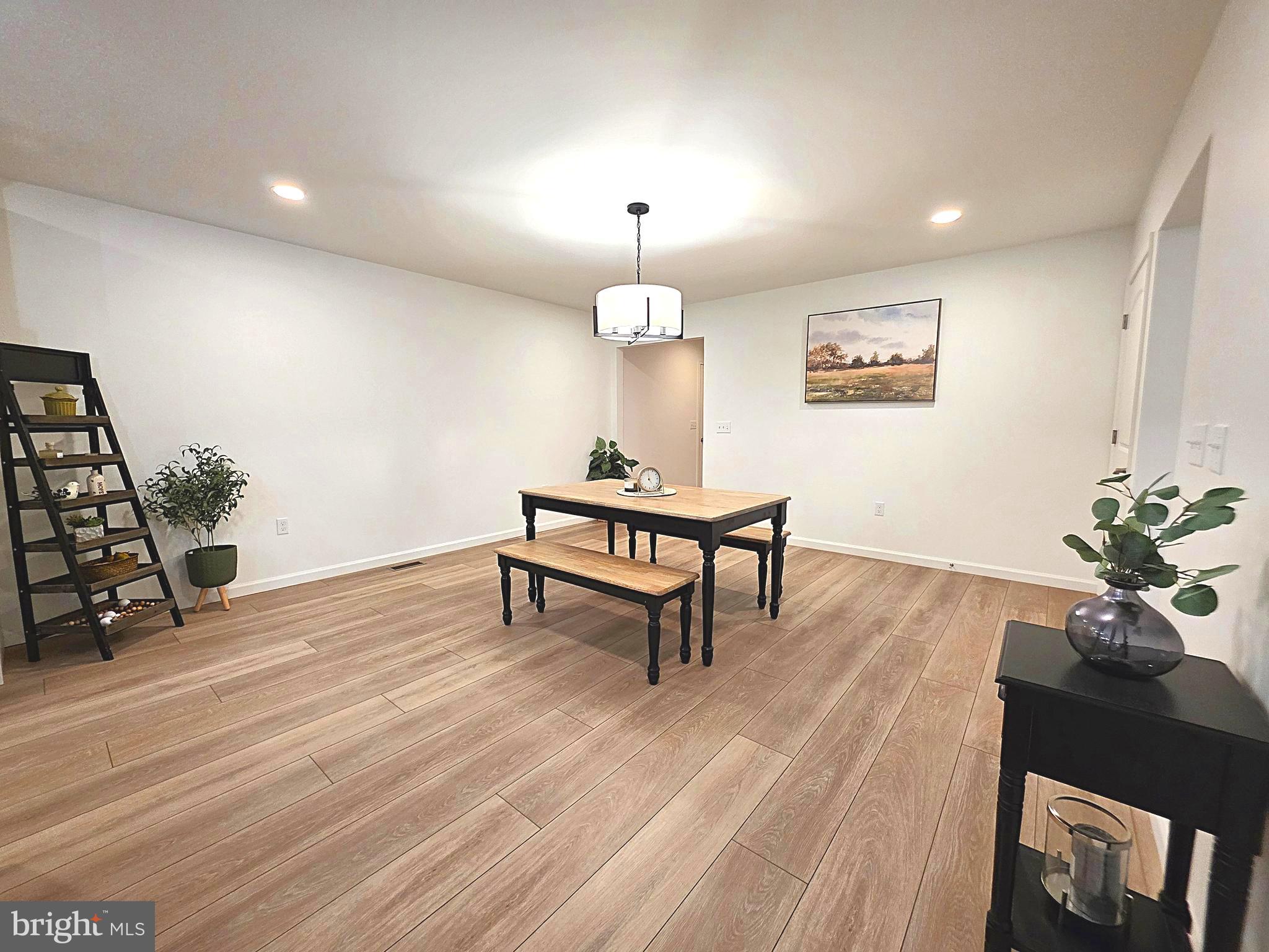 108 Bungalow Road Enola, PA 17025 - Photo 10 of 23 a living room with furniture and a wooden floor