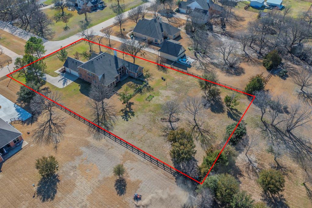 7517 Rodeo Drive Denton, TX 76208 - Photo 6 of 39 This aerial view from the back shows the approximate boundaries and extent of lot. Imagine what you can do here!