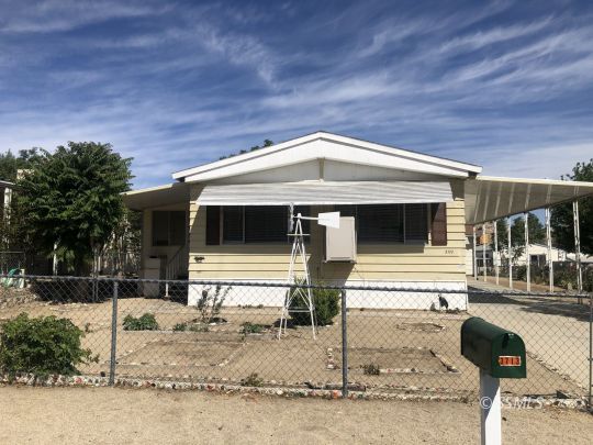 3713 Goat Ranch Road Mountain Mesa, CA 93240 - Photo 1 of 43 a front view of a house with garden