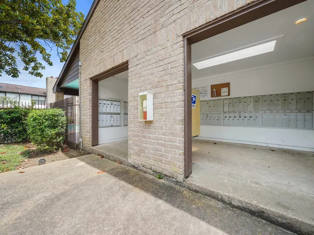 a room with wooden floor and furniture