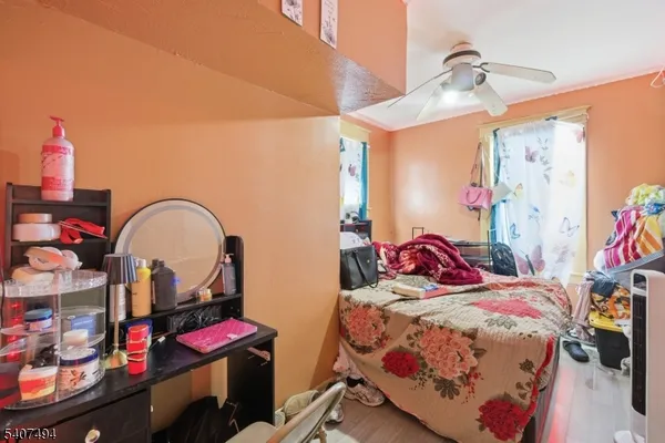 a bathroom with a shower and a sink