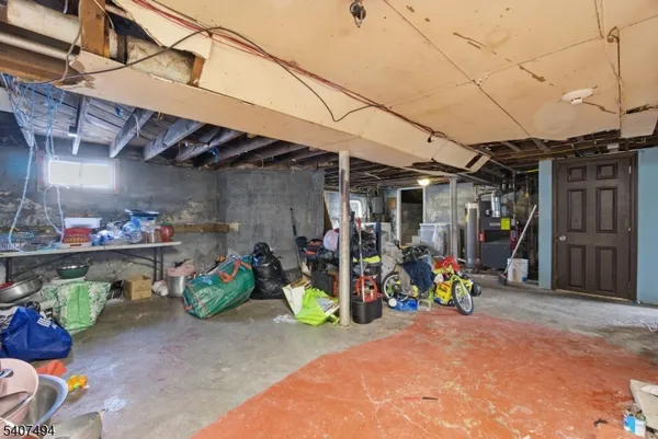 a kitchen with stainless steel appliances granite countertop a stove and a refrigerator