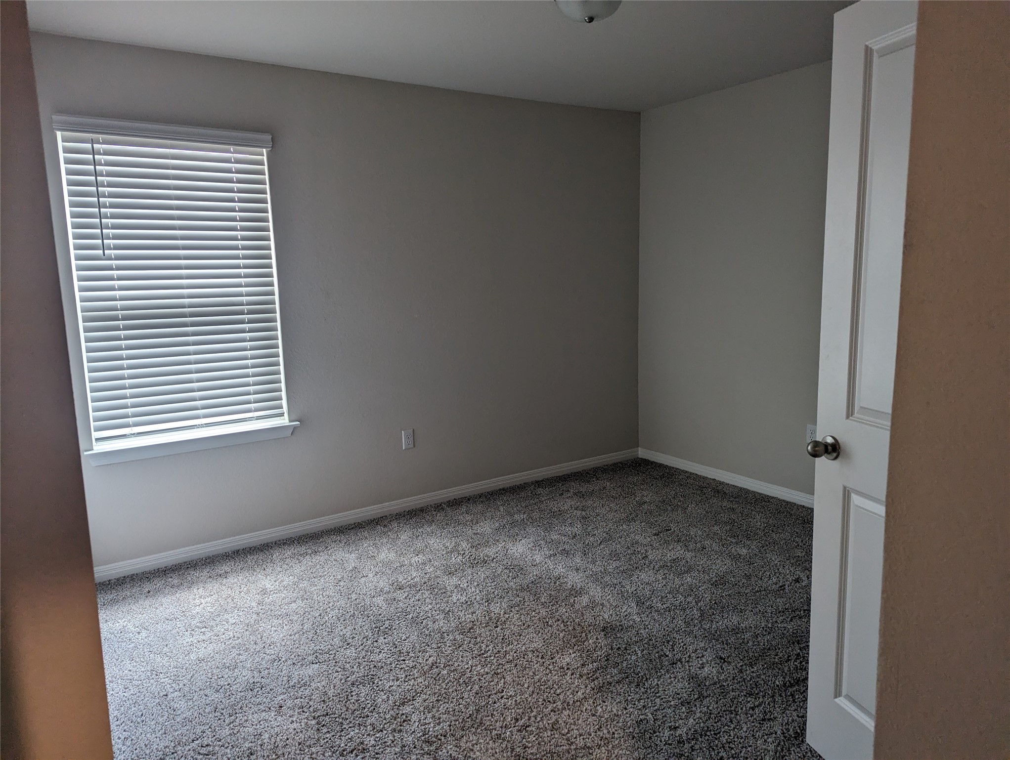 6400 Rounded Pebble Lane Buda, TX 78610 - Photo 23 of 34 an empty room with a window