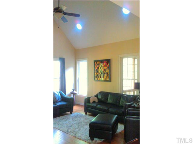 9108 Wellsley Way Raleigh, NC 27613 - Photo 14 of 14 a living room with furniture and a window