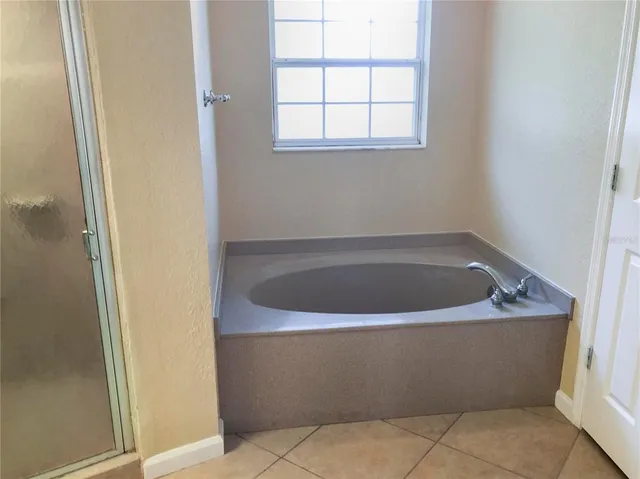 a view of a bathtub in a bathroom