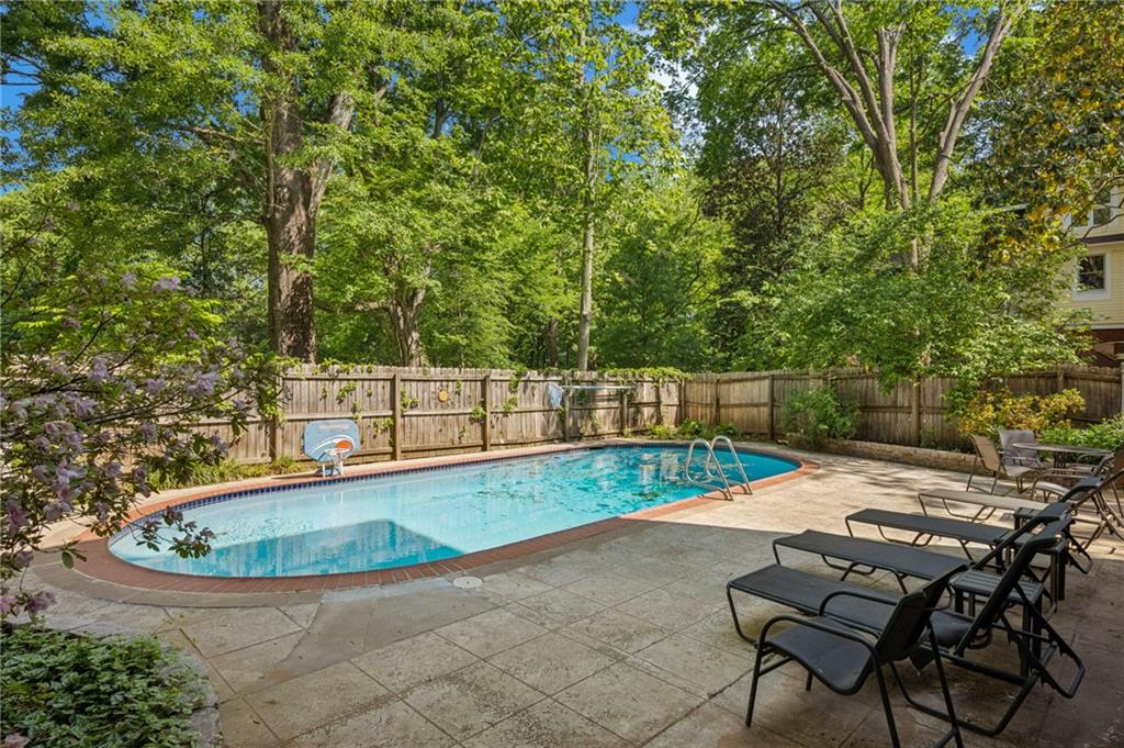 926 Waverly Way Northeast, Unit F Atlanta, GA 30307 - Photo 28 of 33 a view of a backyard with swimming pool