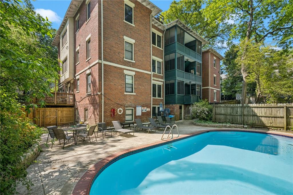 926 Waverly Way Northeast, Unit F Atlanta, GA 30307 - Photo 29 of 33 a view of a house with swimming pool and sitting area
