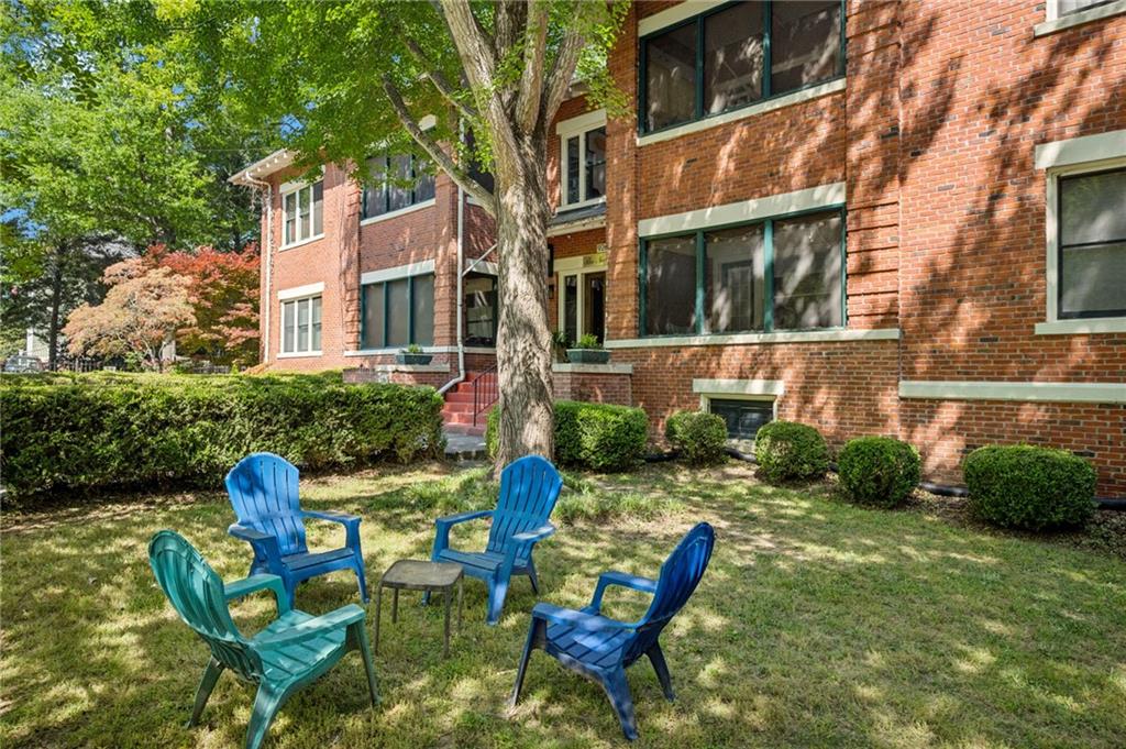 926 Waverly Way Northeast, Unit F Atlanta, GA 30307 - Photo 31 of 33 a view of backyard with outdoor seating and plants