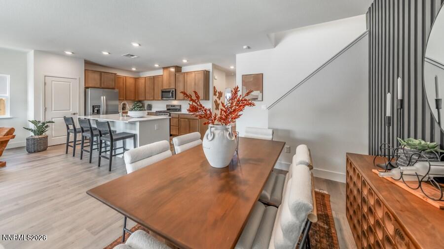 4302 Painted Cloud Way Sparks, NV 89436 - Photo 11 of 30 a kitchen with a table and chairs