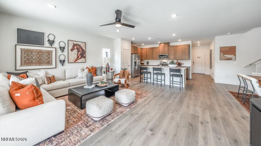4302 Painted Cloud Way Sparks, NV 89436 - Photo 15 of 30 a living room with furniture and wooden floor