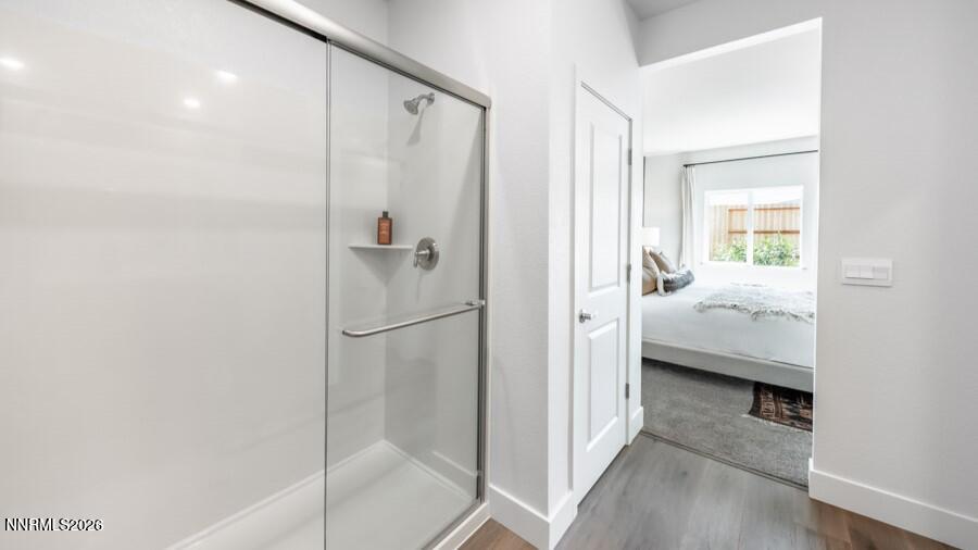 4302 Painted Cloud Way Sparks, NV 89436 - Photo 21 of 30 a bathroom with a sink and a shower
