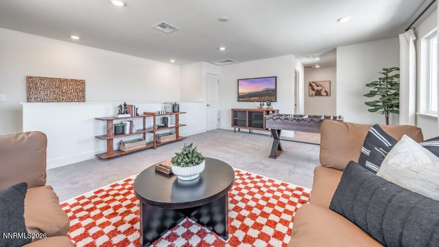4302 Painted Cloud Way Sparks, NV 89436 - Photo 24 of 30 a living room with furniture and a wooden floor