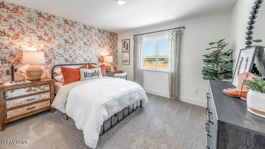4302 Painted Cloud Way Sparks, NV 89436 - Photo 27 of 30 a bedroom with bed and a potted plant