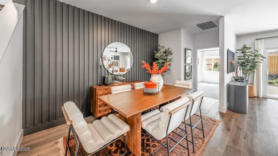 4302 Painted Cloud Way Sparks, NV 89436 - Photo 10 of 30 a view of a dining room with furniture and wooden floor