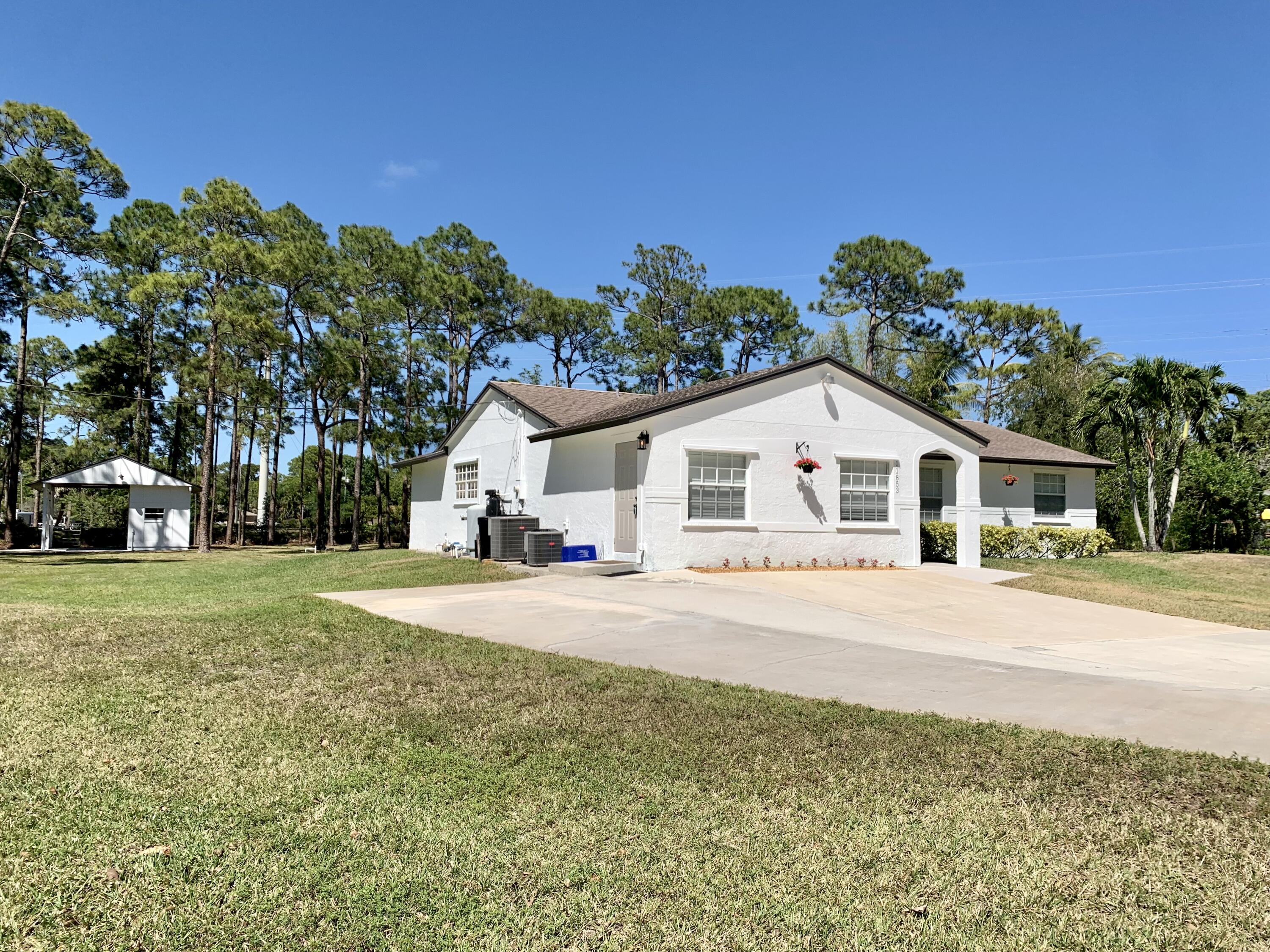 11853 47th Road North The Acreage, FL 33411 - Photo 22 of 22 Front Side 4