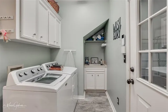 a utility room with dryer and washer