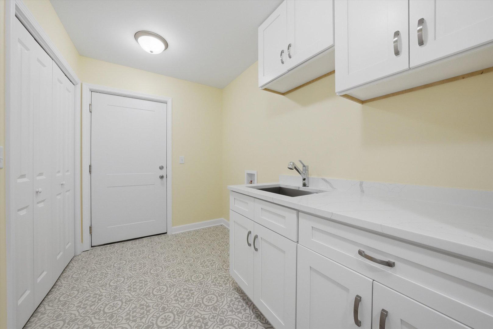 477 Emma Drive Manteno, IL 60950 - Photo 12 of 29 a kitchen with a sink and cabinets