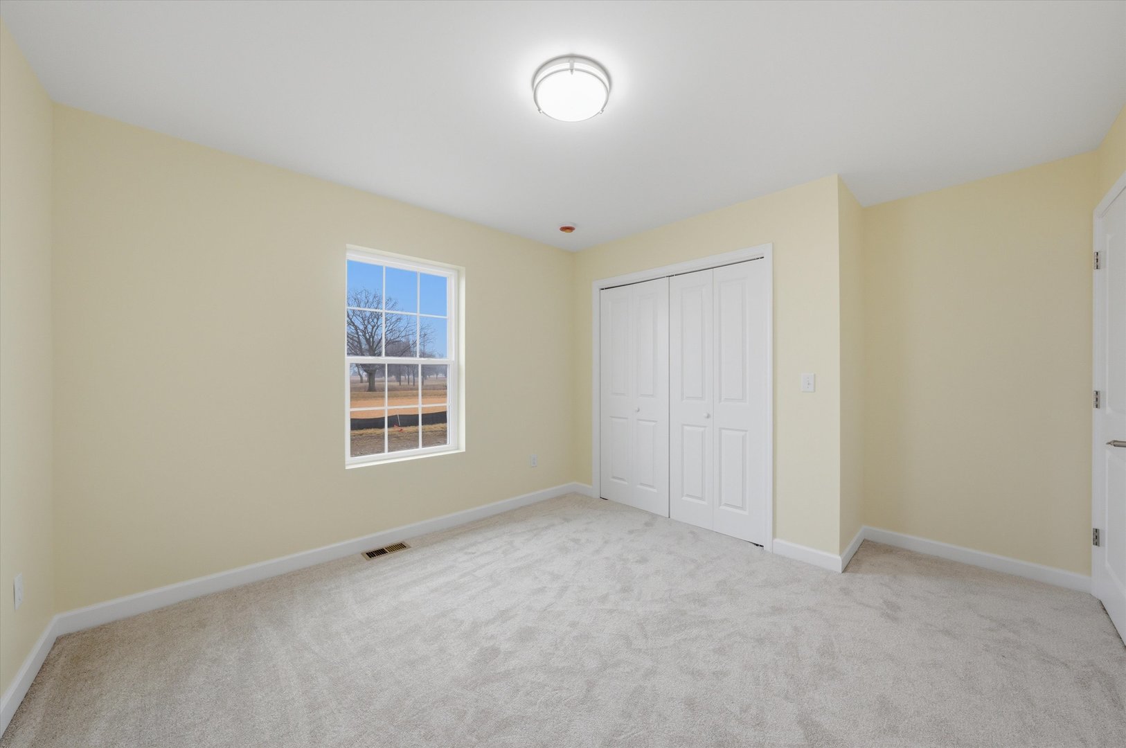 477 Emma Drive Manteno, IL 60950 - Photo 17 of 29 a view of an empty room with a window