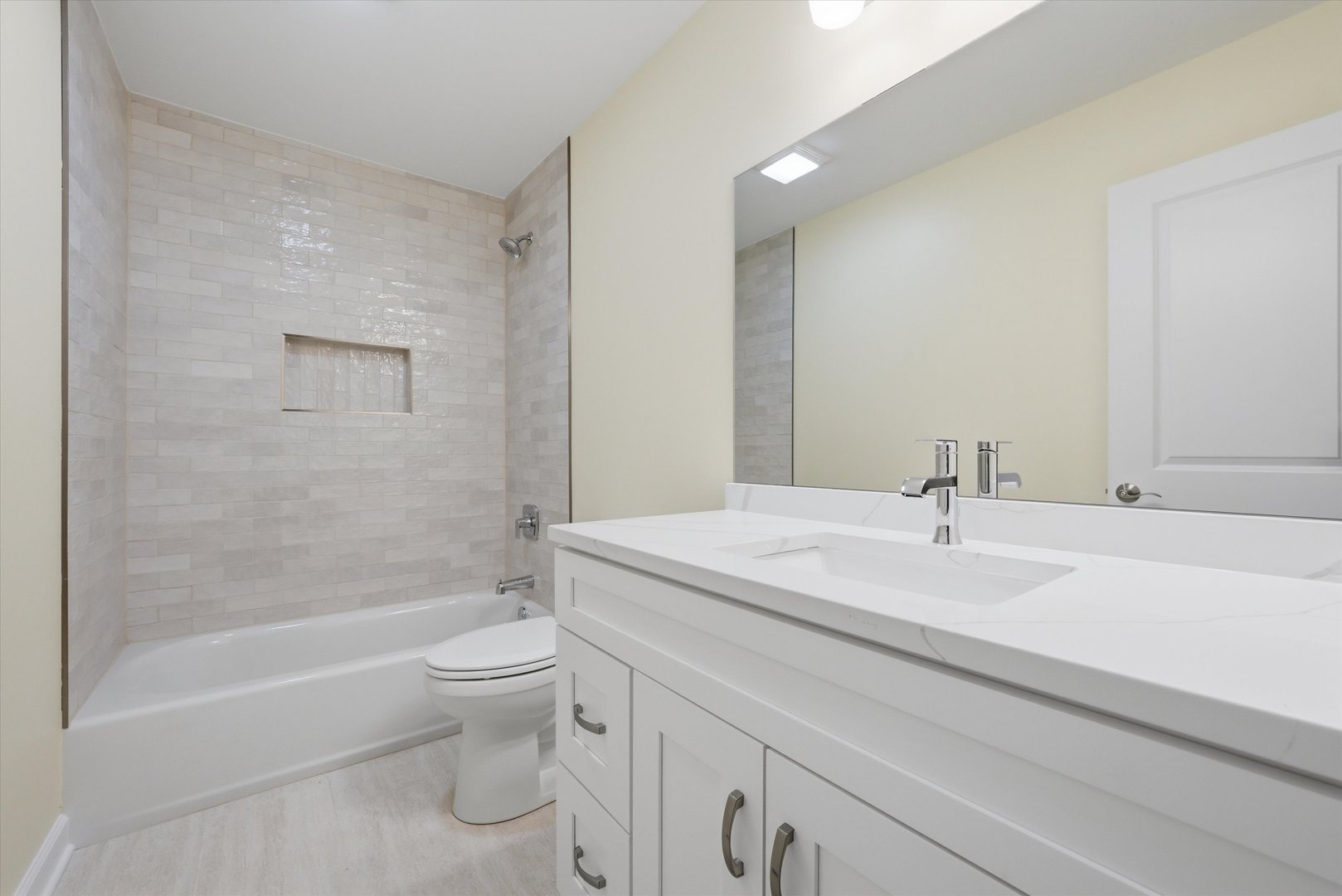 477 Emma Drive Manteno, IL 60950 - Photo 20 of 29 a bathroom with a sink a toilet and a large mirror