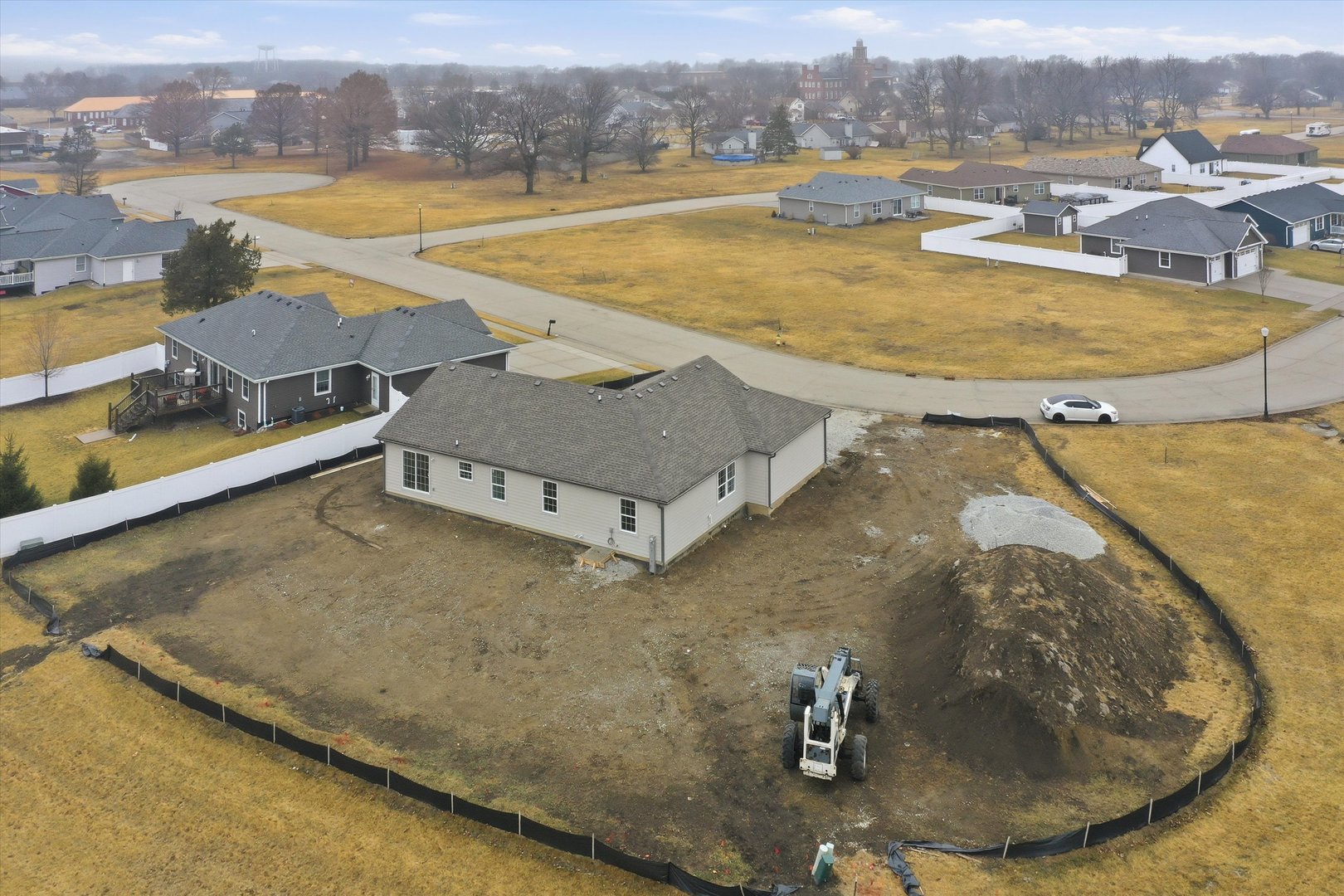 477 Emma Drive Manteno, IL 60950 - Photo 29 of 29 an aerial view of a house with a swimming pool and lake view
