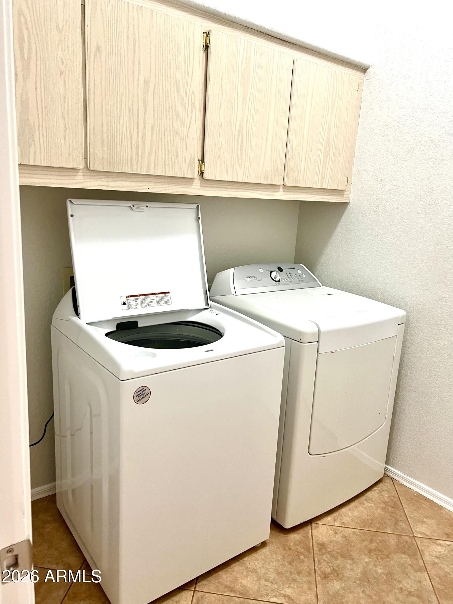 407 West Helena Drive Phoenix, AZ 85023 - Photo 28 of 35 a utility room with dryer and washer