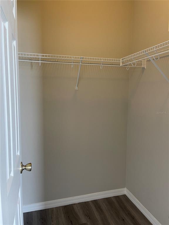 606 Sunset View Drive Davenport, FL 33837 - Photo 13 of 30 a view of a room with wooden floor