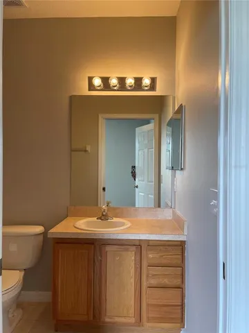 a bathroom with a sink and a toilet