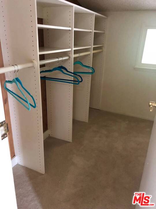 9601 Heather Road Beverly Hills, CA 90210 - Photo 15 of 21 a view of an empty room