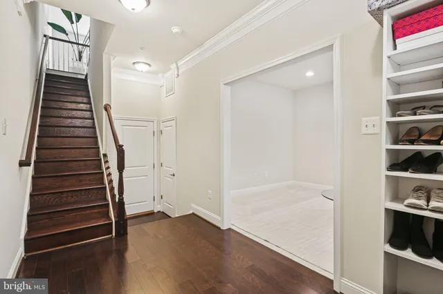 a view of entryway with wooden floor