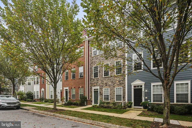 front view of a building with a yard
