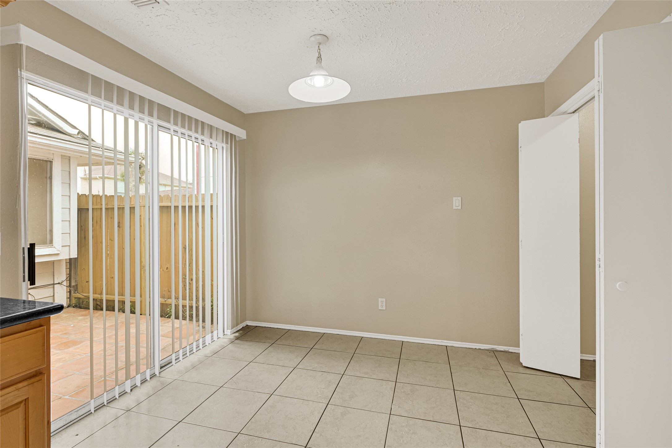 12322 Meadow Ridge Drive Stafford, TX 77477 - Photo 13 of 39 a view of an empty room with a window