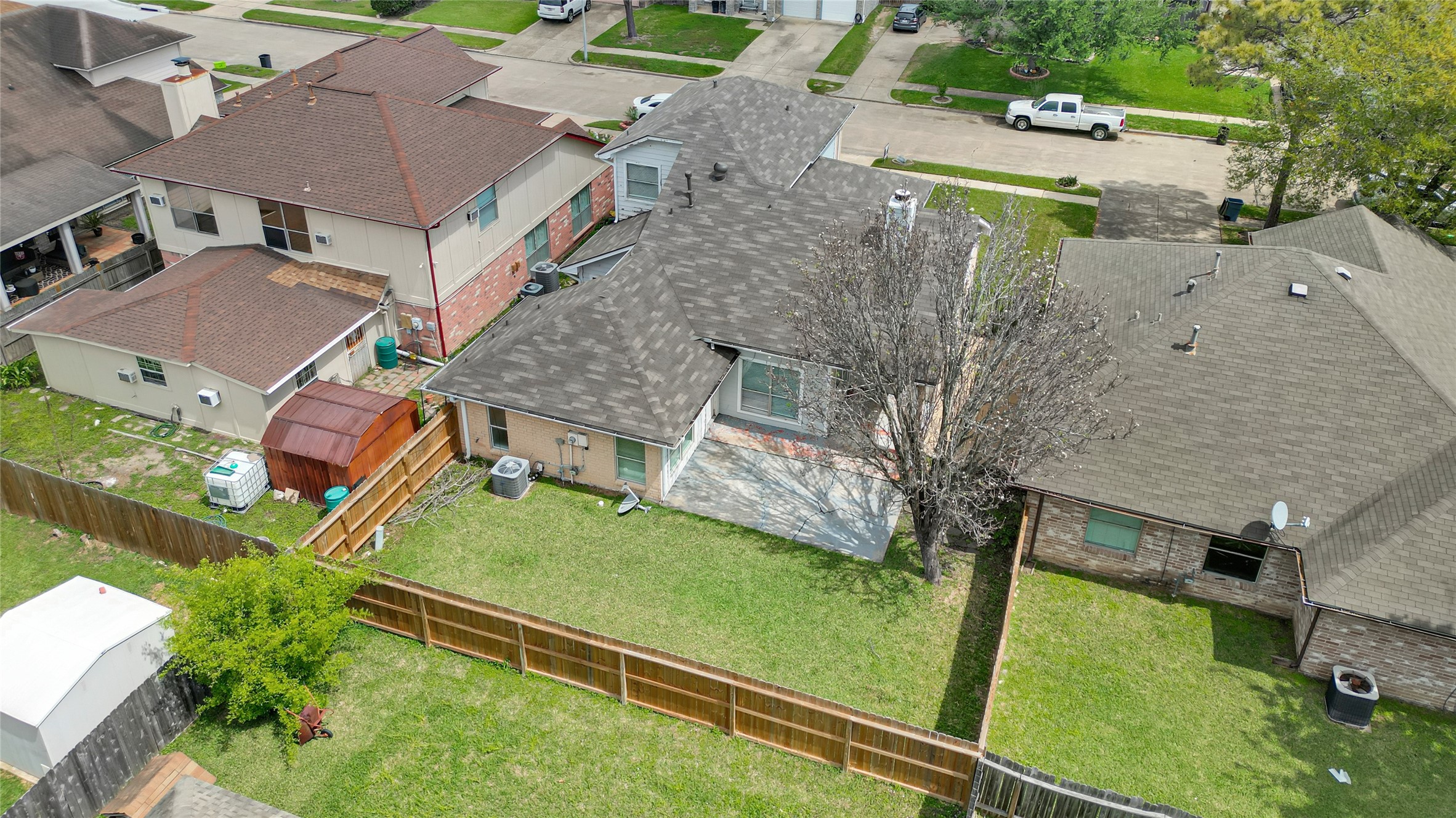 12322 Meadow Ridge Drive Stafford, TX 77477 - Photo 36 of 39 an aerial view of a house with a yard