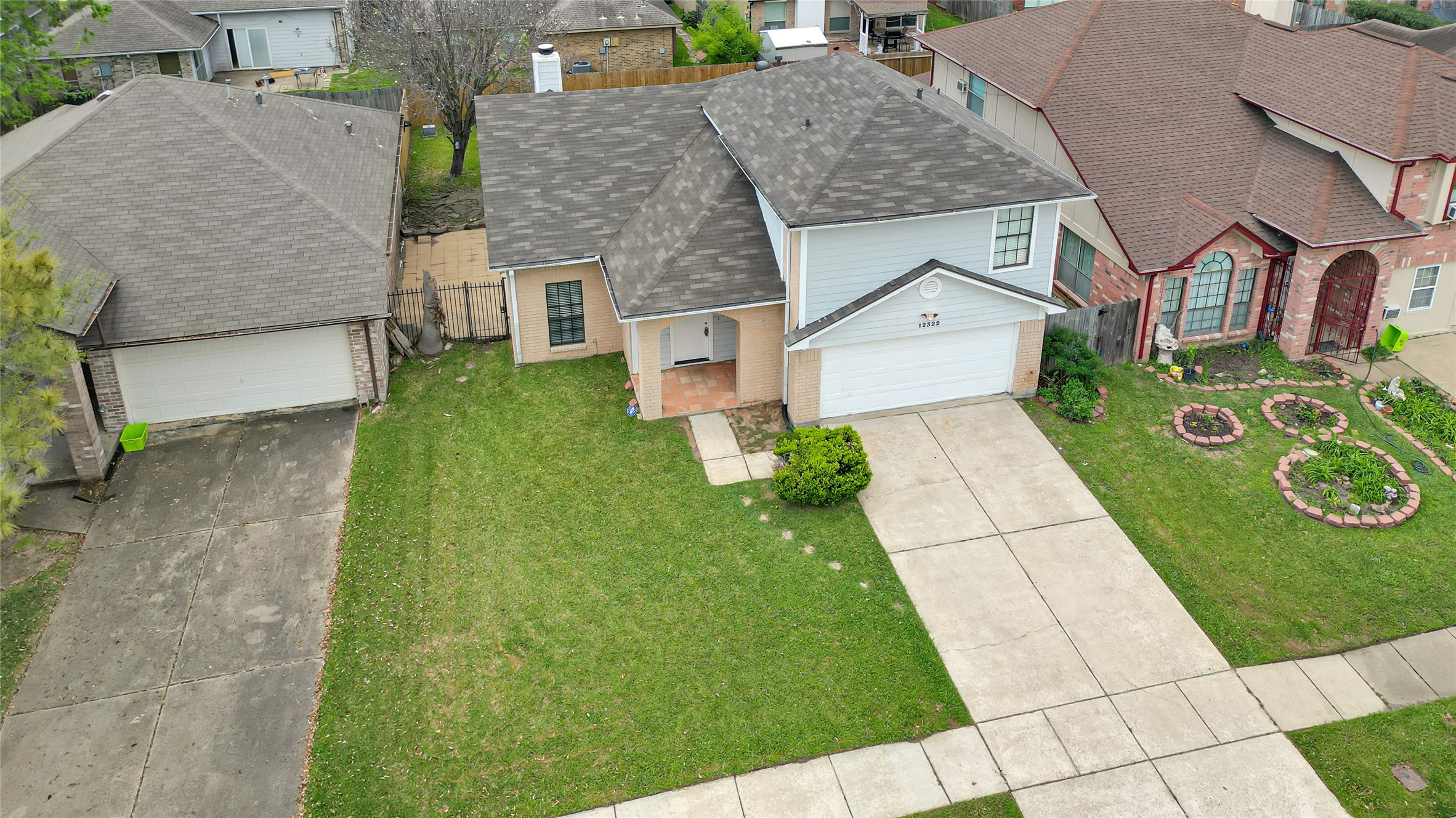 12322 Meadow Ridge Drive Stafford, TX 77477 - Photo 38 of 39 a aerial view of a house with a yard